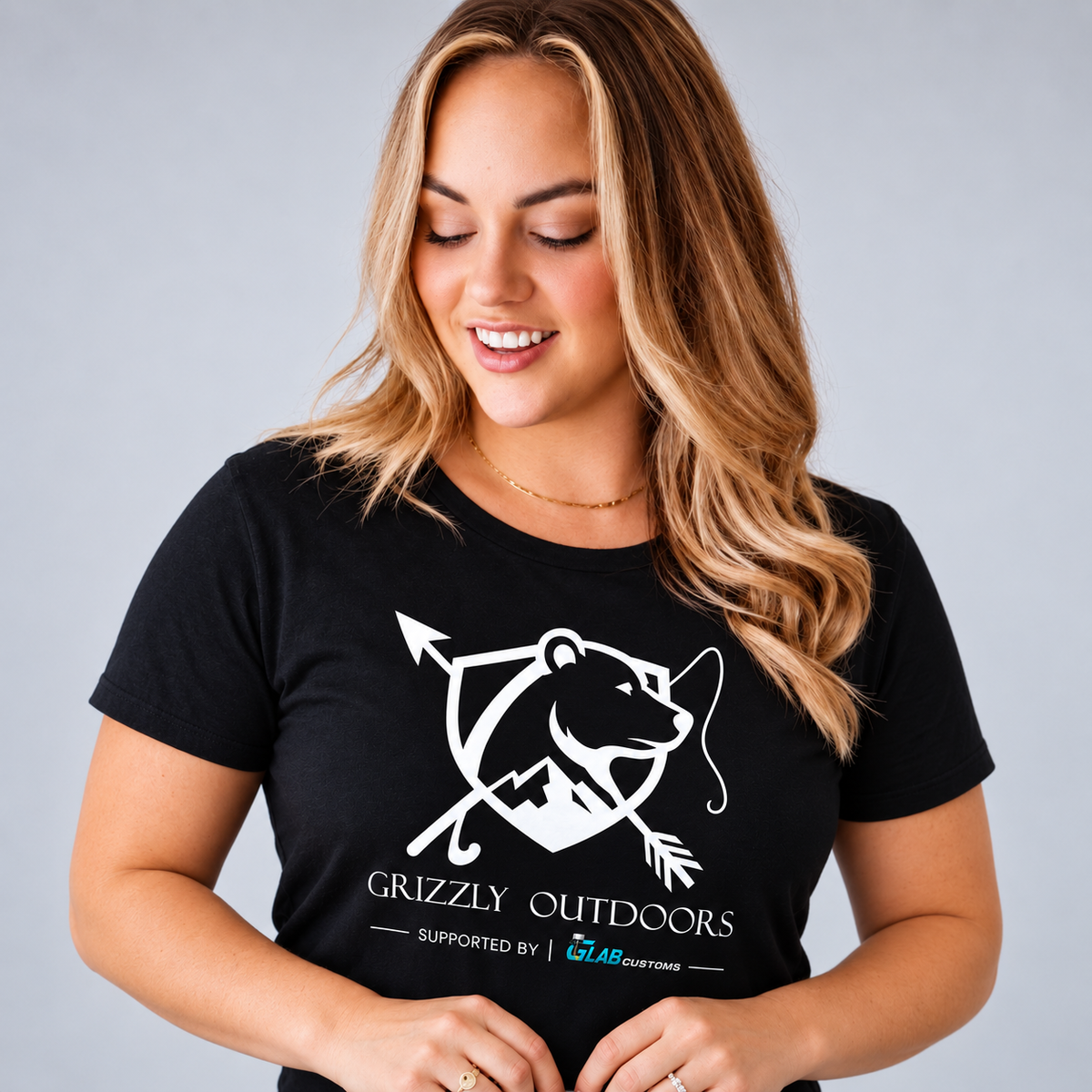 Rebecca modelling a black Grizzly Outdoors shirt