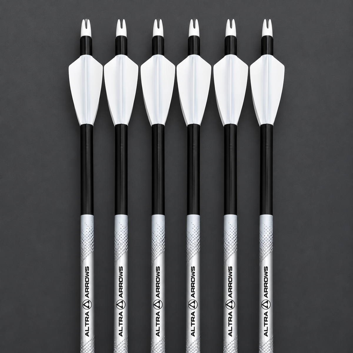 Six white Grizzly slide-on vanes on custom-size arrows, close product view