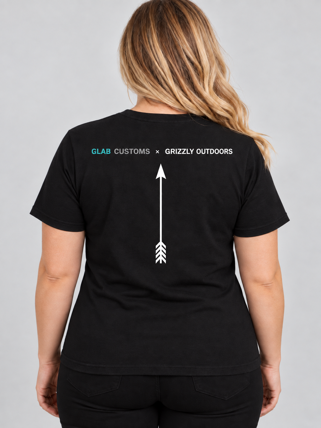 Bec modelling the back of the black Grizzly Outdoors T-shirt